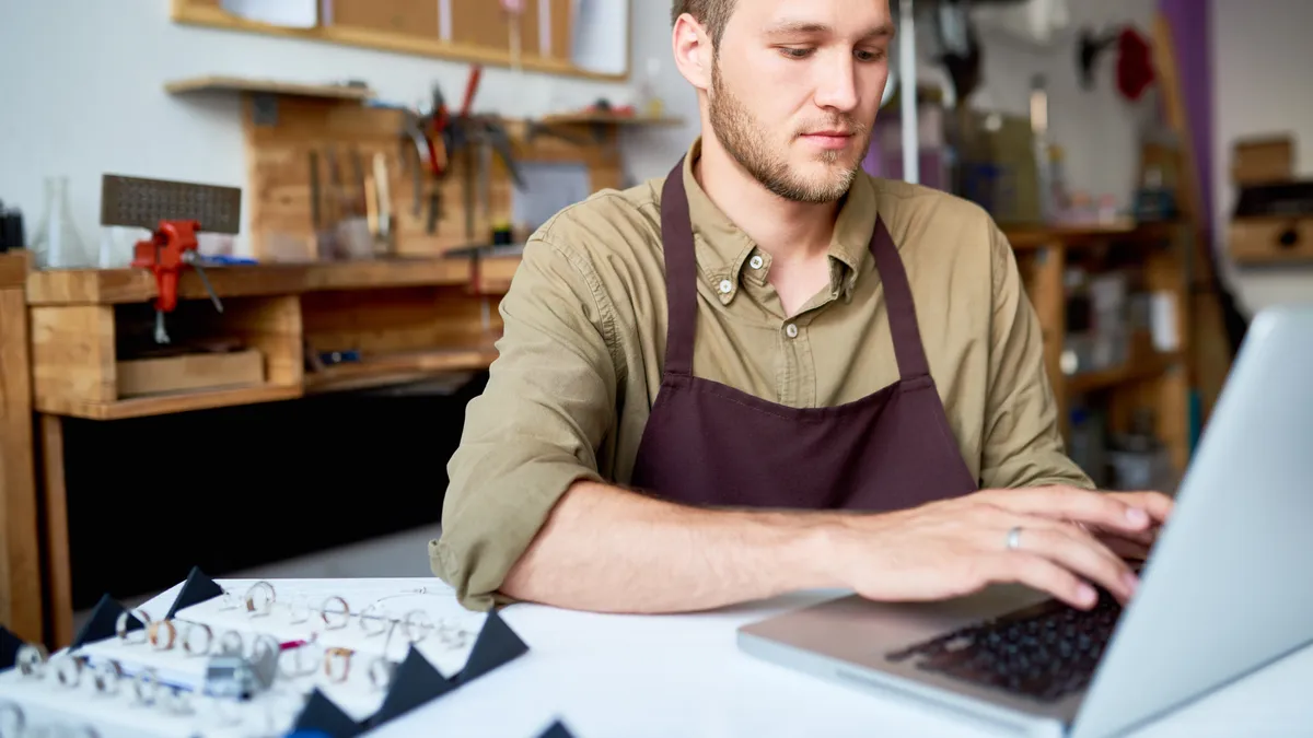 Website Builder vs Hiring a Designer: An Honest 2026 Comparison